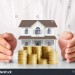 stock-photo-mortgage-concept-by-money-house-from-the-coins-433467922